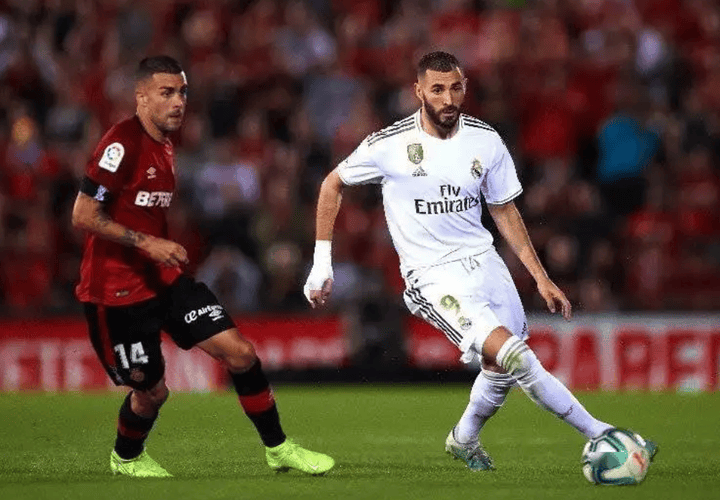 杏彩体育-皇家马德里险胜，继续领跑联赛